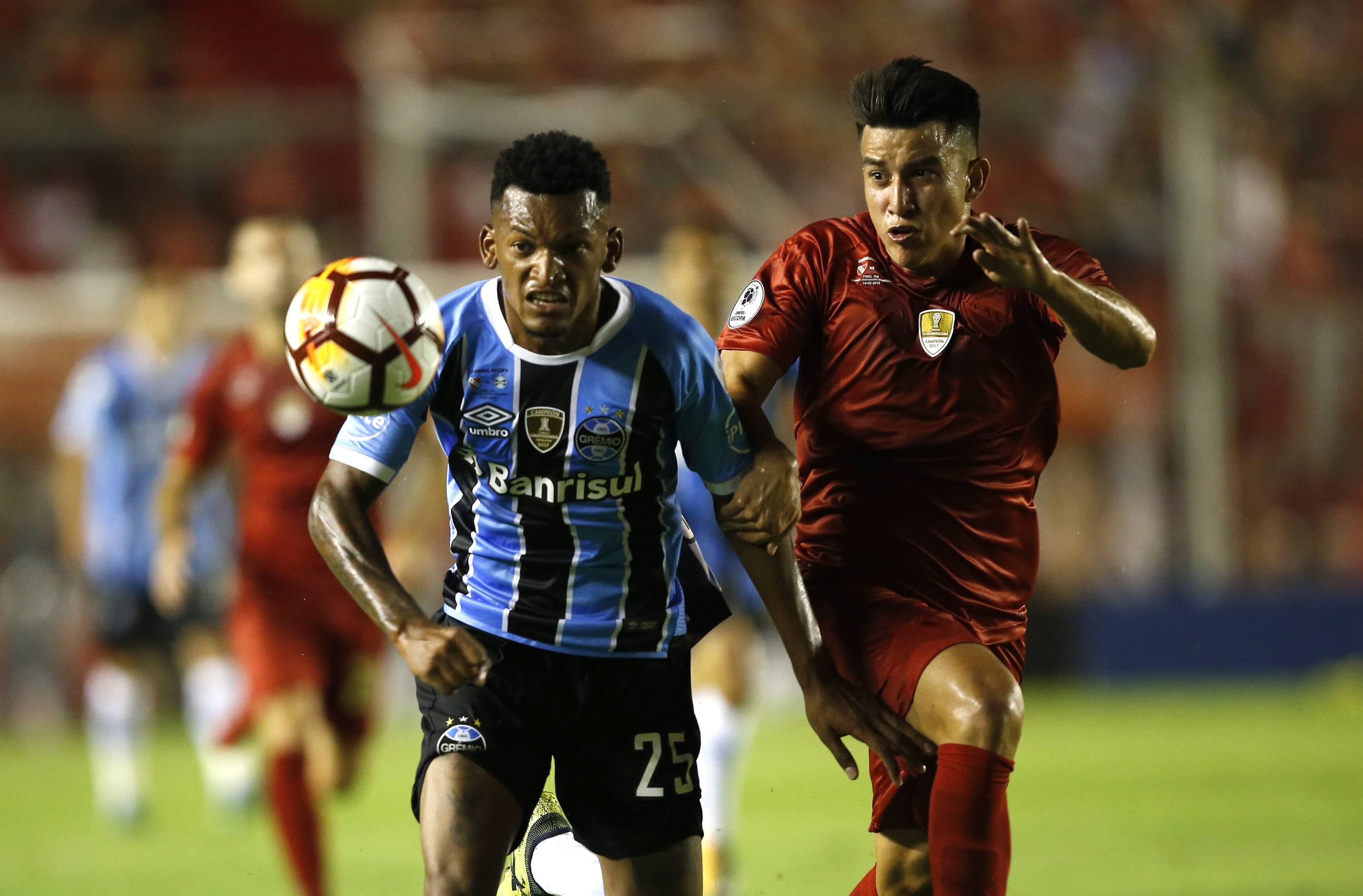 Independiente S Fernando Gaibor R Vies For The Goal Against Jailson L Of Gremio During The Recop