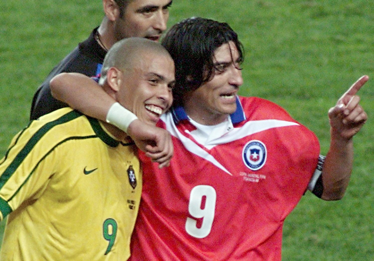 Chilean Forward Ivan Zamorano (r) Hugs B