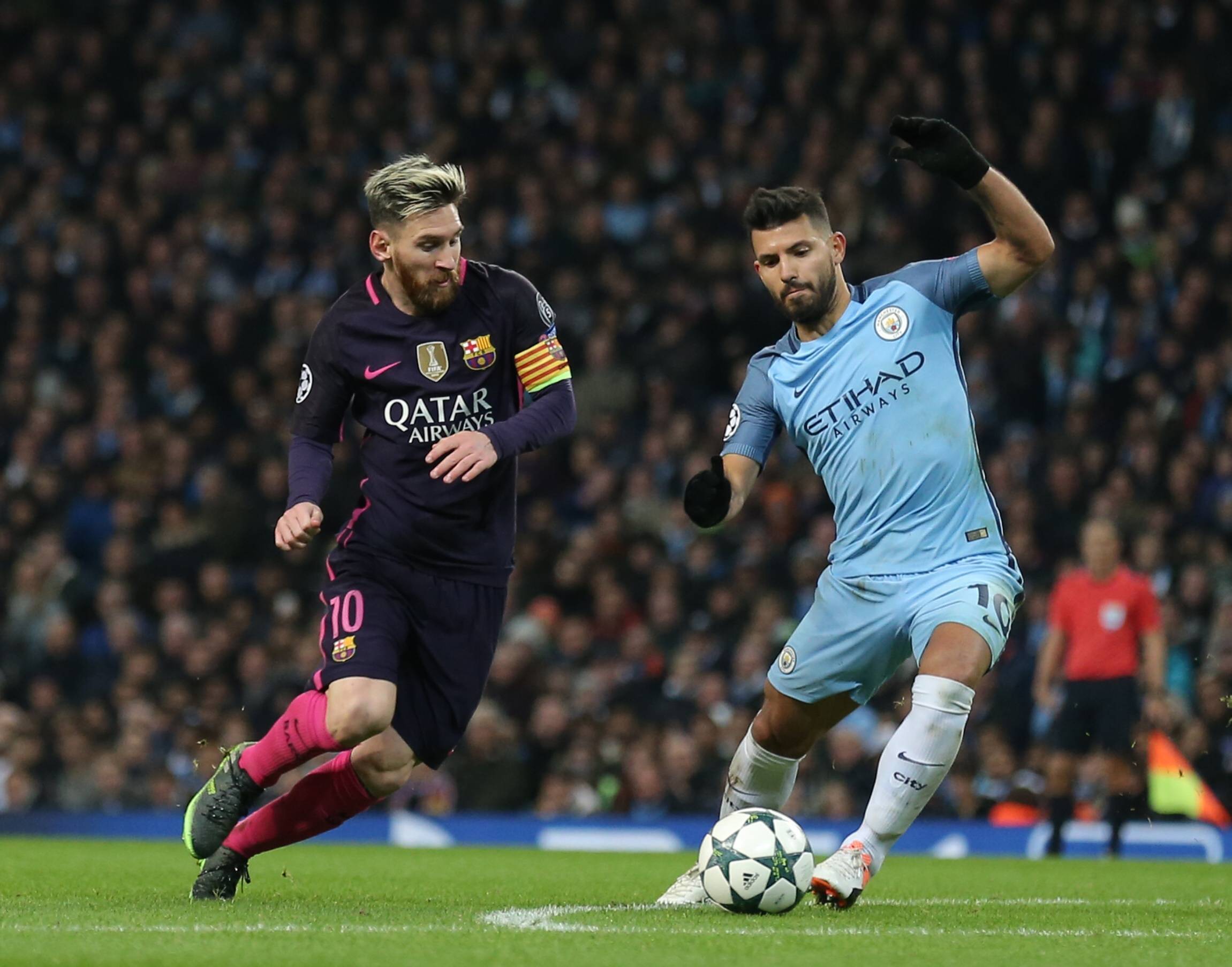 Lionel Messi Of Barcelona And Sergio Aguero Of Manchester City During The Champions League Group C Match At The Etihad