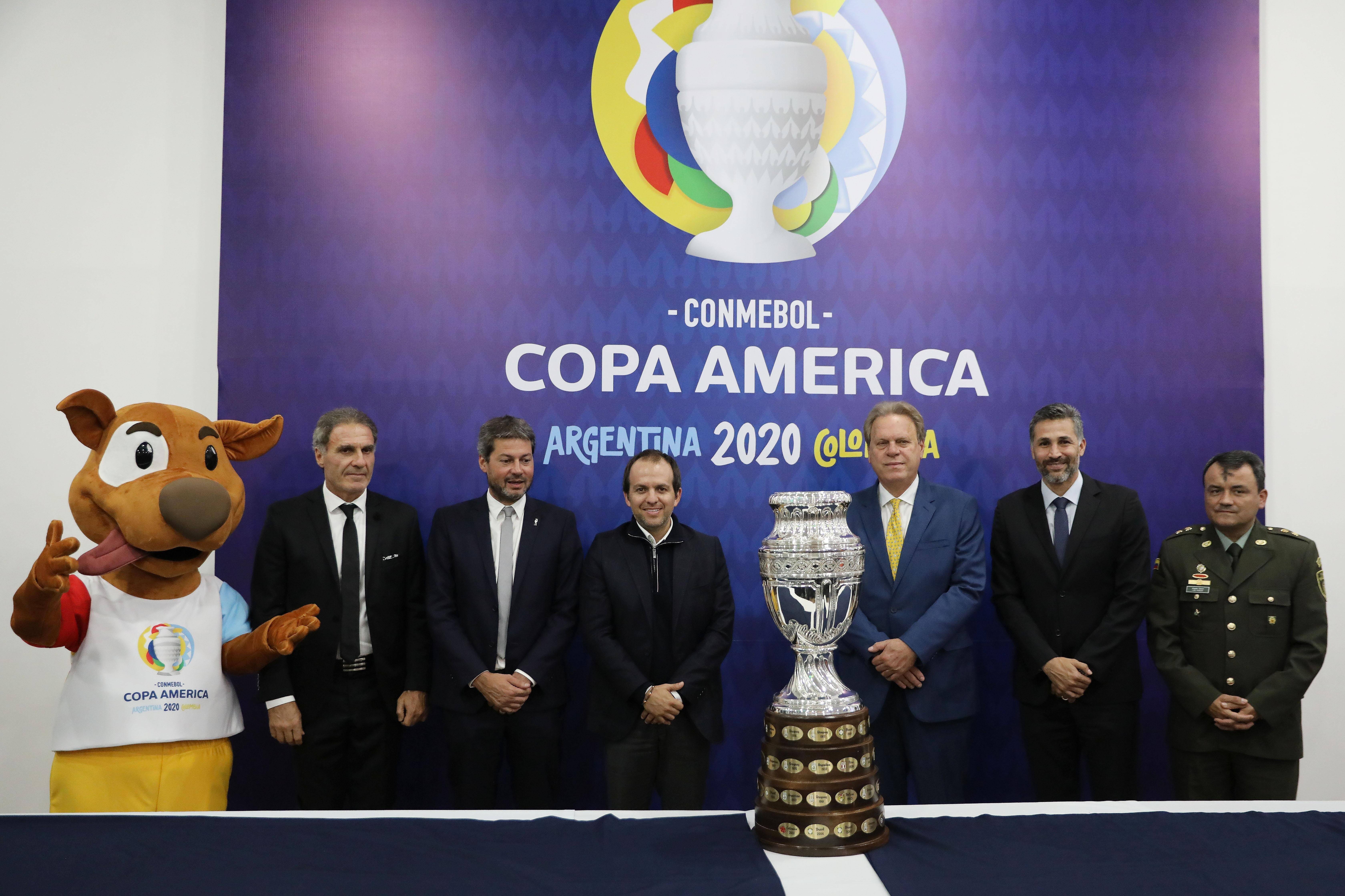 (left To Right) The Mascot Of The Copa America 2020; The Former Captain Of The Argentine Soccer Team Oscar Ruggeri; The