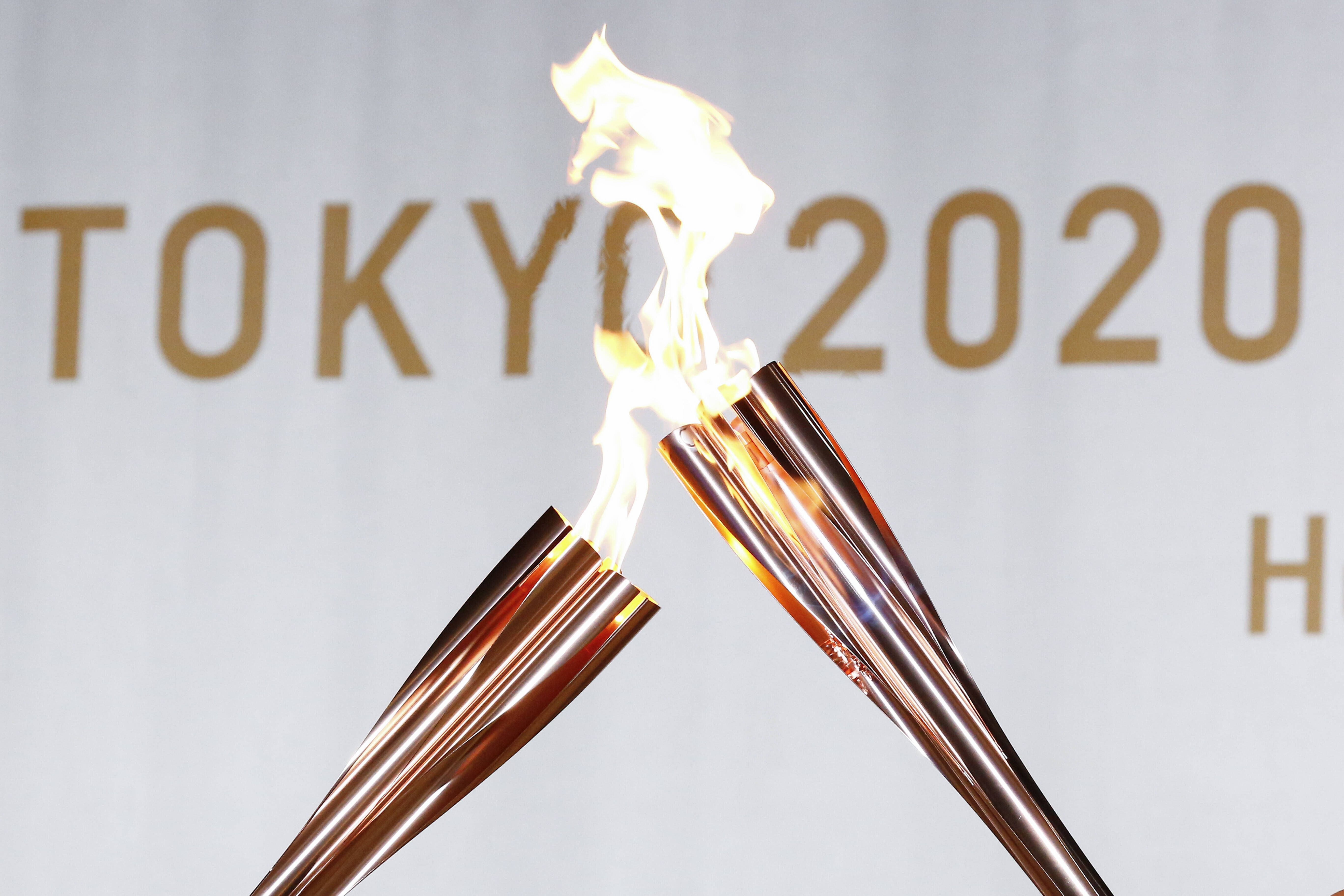 July 12, 2021, Tokyo, Japan: Olympic Flame Torches Kiss During A Tokyo 2020 Olympic Torch Relay Event For Hamura City A